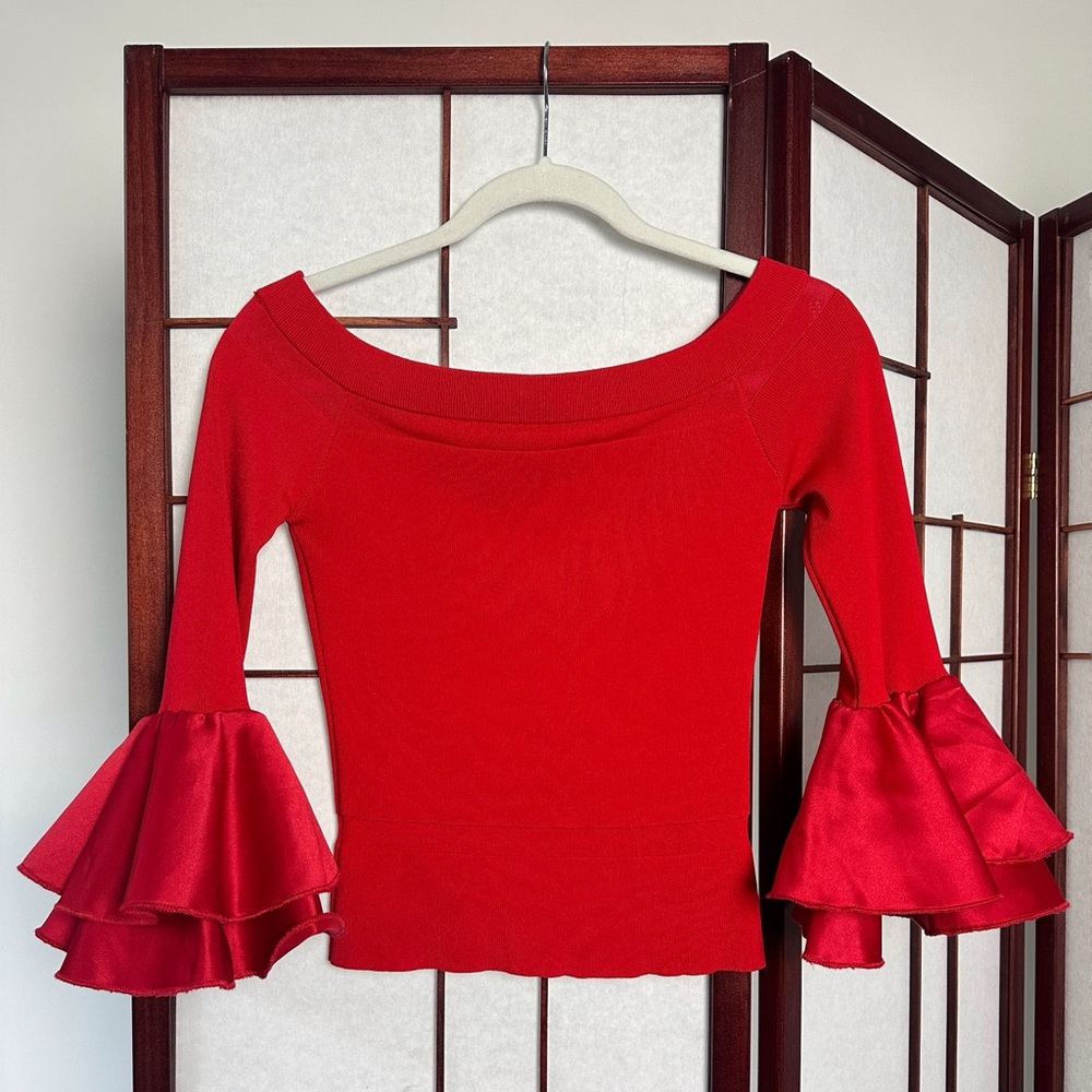 Red flamenco stlye top. New without tags - never worn. In pristine condition.